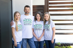 Portrait style photo of Jenna Mihalevich's family including sister, father, mother and Jenna.